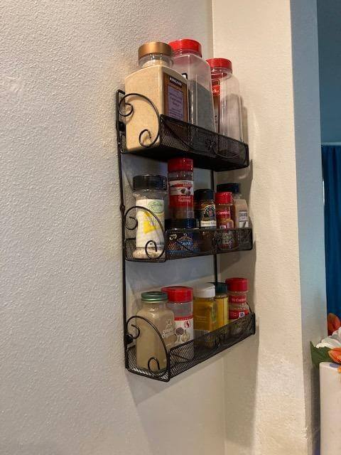 7. DecoBros 3 Tier Wall Mounted Spice Rack, Bronze