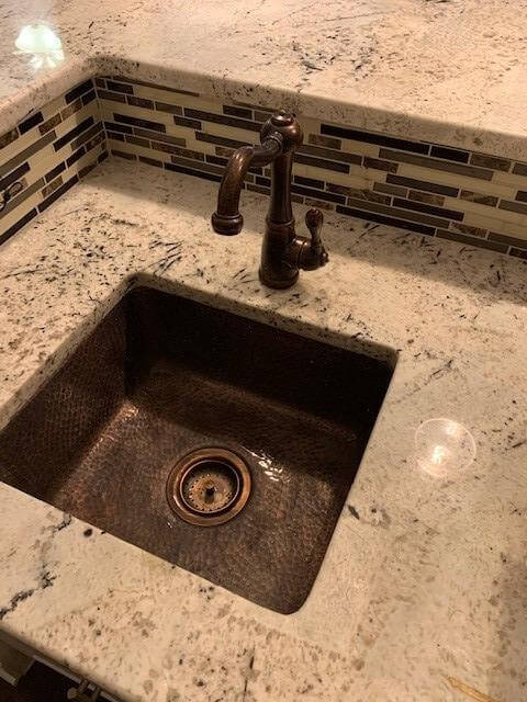 1. Monarch Abode 17090 Pure Copper Hand Hammer Highball Single Bowl Kitchen Sink (17 inch)
