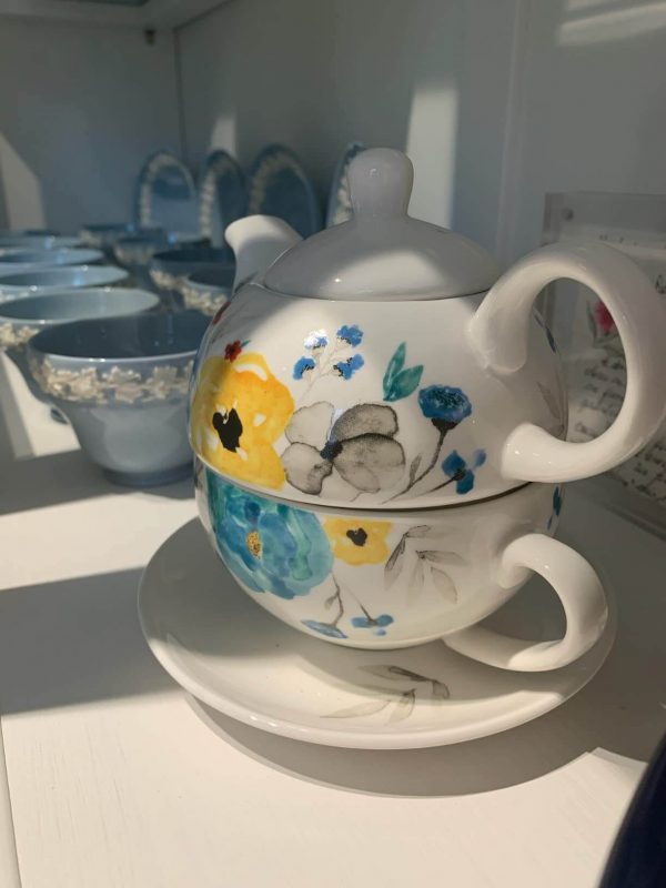 5. Antique Flower Teapot and Saucer
