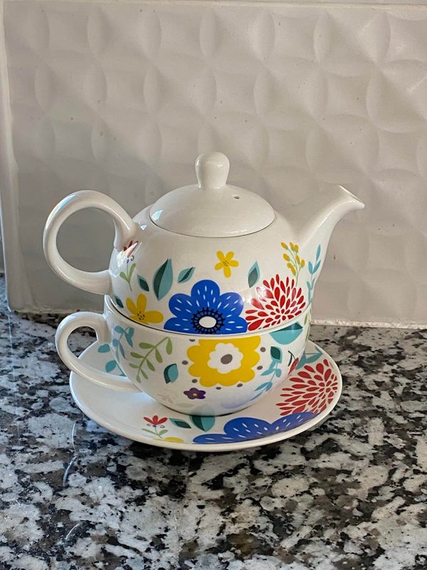 5. Antique Flower Teapot and Saucer