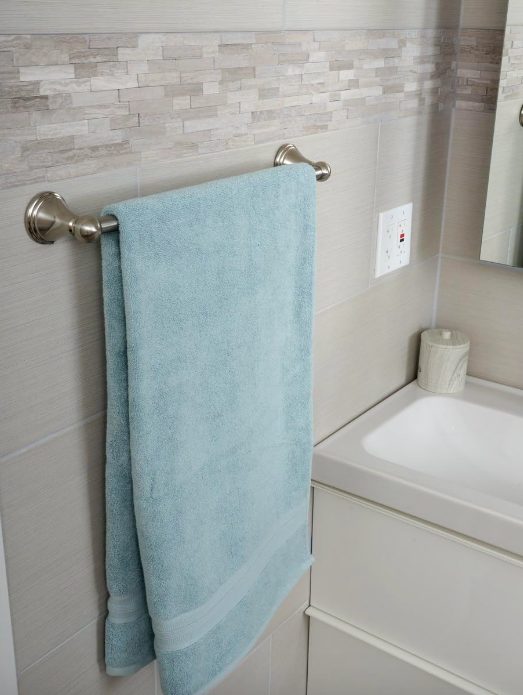 1. Amazon Basics Modern Bathroom Towel Straight Bar Rack