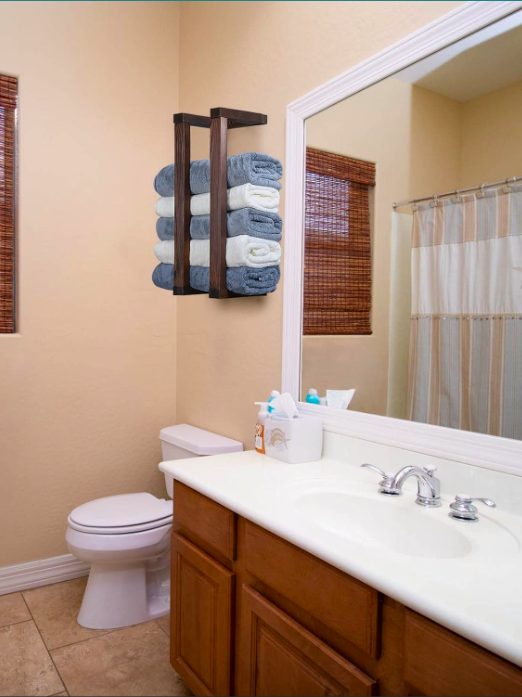 1. Decorative Pine Towel Rack for Rolled Towel Organizer